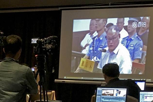消失近半年後首次露面 李明哲「被認罪」